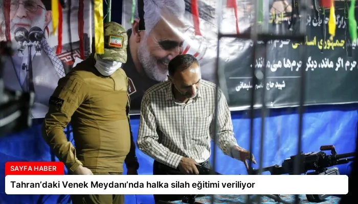 Tahran’daki Venek Meydanı’nda halka silah eğitimi veriliyor
